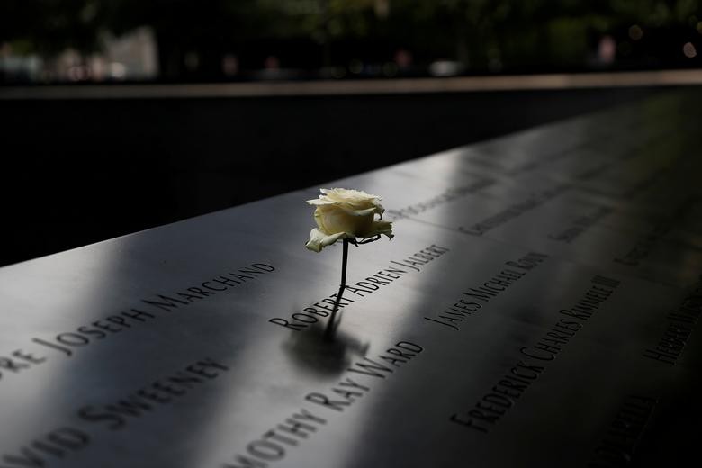 A rose is placed on one of the victims' names at the south reflecting pool of the National 9/11 Memorial in lower Manhattan, New York.   REUTERS/Shannon Stapleton  